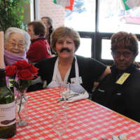 <p>Seniors in the Waveny LifeCare Networks Adult Day Program enjoy a bistro lunch on around the world day. </p>