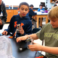 <p>Sixth-grade students at Briarcliff Middle School created a number of electricity-based circuit creations as part of the first Electricity Maker Faire.</p>