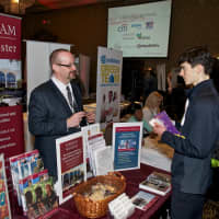 <p>Grant Grastorf, academic operations administrator for Fordham University&#x27;s campus in Harrison talks to a prospective student.</p>