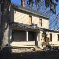 <p>The home where a first-floor fire trapped an elderly bedridden woman inside Wednesday.</p>