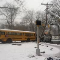 <p>The school bus is towed from the crash scene Friday afternoon in Stamford. </p>
