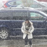 <p>Shoppers get a surprise snowfall as winter turned into spring at the Danbury Fair Mall. </p>