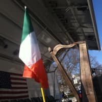 <p>The harp and the Irish flag, a pair of symbols representing Ireland at the St. Patrick&#x27;s Day parade in Greenwich on Sunday.</p>