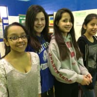 <p>Sophia Montenagro, Jessica Racarriello, Faith Tomusula and Penelope Alvarez were there with their classmates to review the work of their fellow seventh-graders.</p>