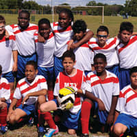 <p>Sixty players  mainly boys with a couple of girls scattered on the three boys teams  currently wear the red, white and blue of the Spirit of Mount Vernon.</p>