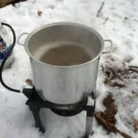 <p>Sap being boiled into maple syrup.</p>