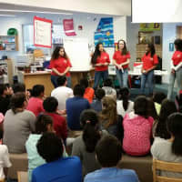 <p>Students from HEART, who attend Brien McMahon High School in Norwalk, talk to students at Brookside Elementary in Norwalk.</p>