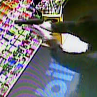 <p>The suspect robbed a Mobil station at approximately 11:50 p.m. </p>