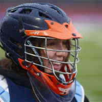 <p>Junior goalie Lindsay Emery watches the action.</p>