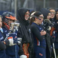 <p>The Quaker bench watches the action during the team&#x27;s season opener.</p>