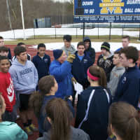 <p>Coach Vin Collins talks to the 2015 spring track and field team.</p>