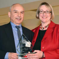 <p> Stamford Public School&#x27;s Mike Meyer receives SPEF Educator Award from SPEF Executive Director Sue Rigano.</p>