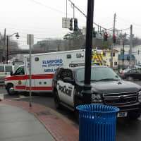 <p>Local police and the Elmford Fire Department ambulance outside the Elmsford post office on Thursday.</p>
