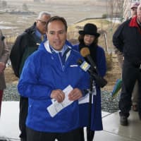 <p>First Selectman Peter J. Tesei addresses the crowd before the ribbon-cutting ceremony.</p>