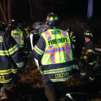 <p>Firefighters at the I-95 crash scene.</p>