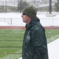 <p>Pleasantville Head Coach Chris Kear watches play at Fox Lane.</p>