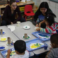 <p>The high school students designed art programs for students. </p>