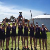 <p>Girls on the Saugatuck Rowing Club team celebrate after winning the gold medal in the Varsity 8+ at the San Diego Classic.</p>
