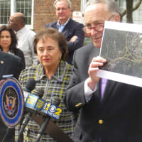 <p>U.S. Sen. Charles Schumer shows the impact of a new Connecticut toll plaza on Interstate-95 near Port Chester and Rye. U.S. Rep. Nita Lowey, left, also was at Tuesday&#x27;s news conference.</p>