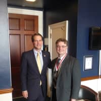 <p>Thomas McMorran, who was named principal of the year, poses with U.S. Rep. Jim Himes. McMorran is now superintendent of the Easton-Redding schools. </p>