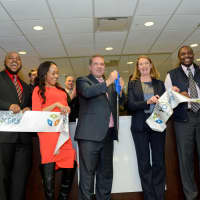 <p>Yonkers Mayor Mike Spano joins leaders from Ridge Hill, Forest City and the local business community to cut the ribbon to celebrate the opening of Regus, the worlds largest provider of flexible workspace, at Ridge Hill. </p>
