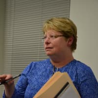 <p>Patti Isaacs speaks at the Bedford Planning Board&#x27;s meeting.</p>