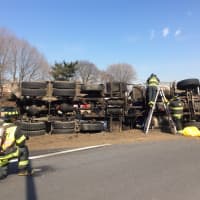 <p>The tractor-trailer came to rest on the driver&#x27;s side. </p>