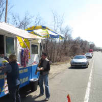 <p>Customers, cars and trucks lined up Thursday outside Anthony&#x27;s New York Hotdogs &amp; More, one of two food trucks in the Town of Harrison. This truck is on Webb Avenue across from 2975 Westchester Ave., near Rye Brook.</p>
