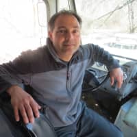 <p>Anthony Romeo in one of his hot dog trucks that are a fair weather tradition in Harrison.</p>
