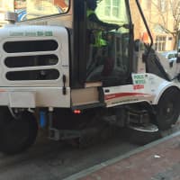<p>A Norwalk street sweeper begins cleaning Washington Street.</p>