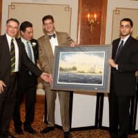<p>L- R - Patrick Brennan James Luton with GE Capital Real Estate, Norwalk Seaport Association President Vinny Scicchitano and Seaport volunteer Mike Bozzuto.</p>