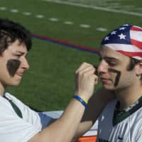 <p>Brewster players prep for the game. </p>