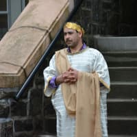 <p>A man plays Pontius Pilate in the re-enactment.</p>