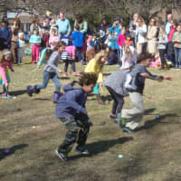 <p>A group of 7-year-olds tears across the Great Lawn to get their Easter eggs to the finish line.</p>