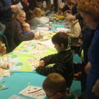<p>Kids enjoy some Easter-themed arts and crafts in Fairfield prior to the Easter Egg Roll.</p>