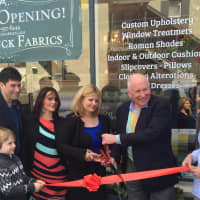 <p>Saugatuck Fabrics owners Leonora Silber Ida Boci, along with family members and First Selectman Jim Marpe, cut the ribbon at the grand opening celebration of the new Westport store.</p>
