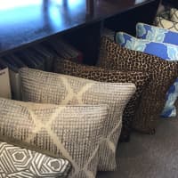 <p>A few of the pillow designs available at Saugatuck Fabrics.</p>