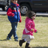 <p>Kids enjoy Easter egg hunting at the Second Congregational Church in Greenwich.</p>