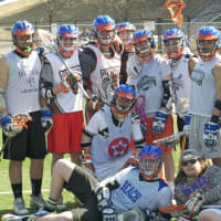 <p>Members of the Danbury High boys lacrosse team at a recent practice.</p>