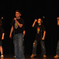 <p>Fire Belly Frogs group act sang &quot;Don&#x27;t Stop Believin&#x27;&quot; by Journey, with Daniel MacLehose singing and behind him (left to right) are Kathryn Reynolds, Eamonn Gallagher, James Tomasello, and Matthew Reynolds.</p>