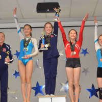 <p>Darien YMCA Level 6 gymnast Lana Schmidt was the all-around champion at the 2015 Connecticut State Championships while teammate Tess Keating placed fourth.</p>
