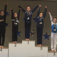 <p>Darien YMCA Level 5 gymnast Leah Wall took first place at the 2015 Connecticut State Championships for her floor routine with a perfect 10.0 score and teammate Tori Ware placed third.</p>