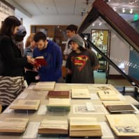 <p>Fairfield High School students learn about primary sources at Pequot Library&#x27;s free private tour of the library&#x27;s Special Collections exhibition.</p>