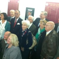 <p>2014 Citizen of the Year Gene Rubino, along with past honorees and Mayor David Martin pose for photographs in a ceremony where Rubino&#x27;s photograph was added to the wall on the fourth floor of the Government Center.</p>