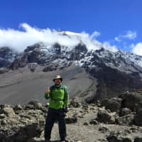 <p>Kurt Kannemeyer at the summit of Mt. Kilimanjaro. </p>