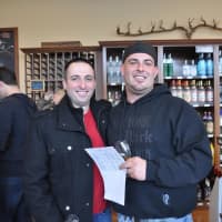 <p>Kevin Amodio and Matt Barberra sample some of the many Whiskies available. </p>