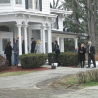 <p>Mourners proceed into the funeral home for the wake of Lacey Carr. </p>