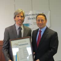 <p>Westchester Library System Executive Director Terry Kirchner with County Executive Rob Astorino.</p>