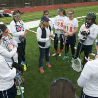 <p>Bears coach Jessica McDonough talks to her players.</p>