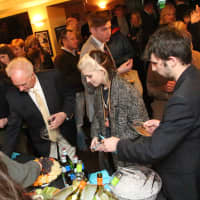 <p>A busy cocktail reception at the Ridgefield Playhouse followed the screening of &quot;Those Who Wander.&quot;</p>